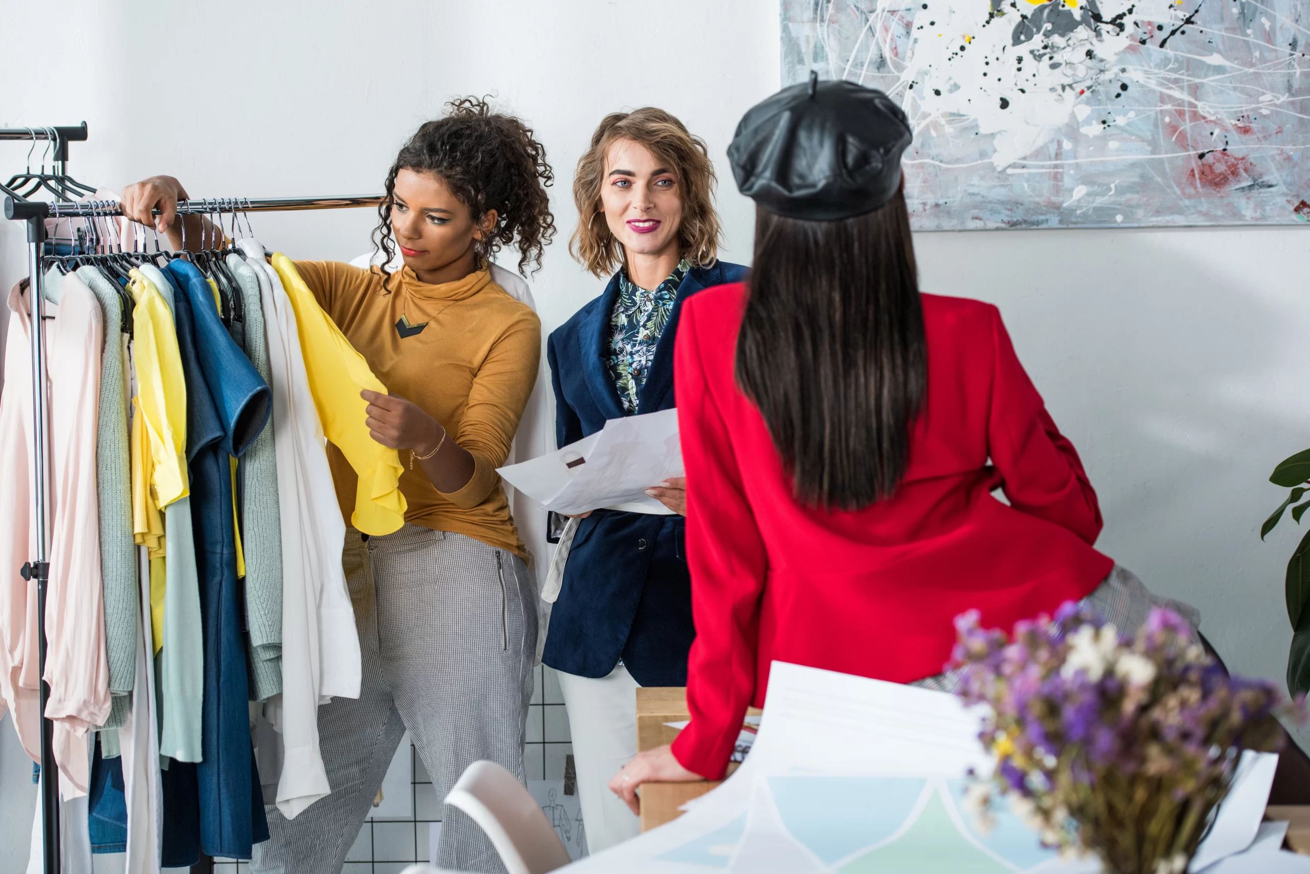 crello-172471996-stock-photo-multiethnic-fashion-designers-working-together