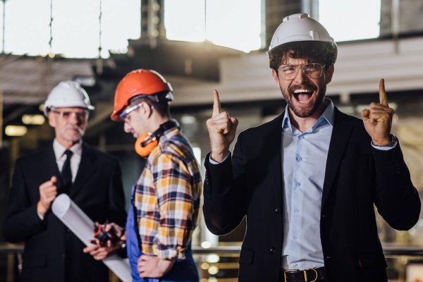 depositphotos_351244866-stock-photo-youngand-happy-business-owner-helmet